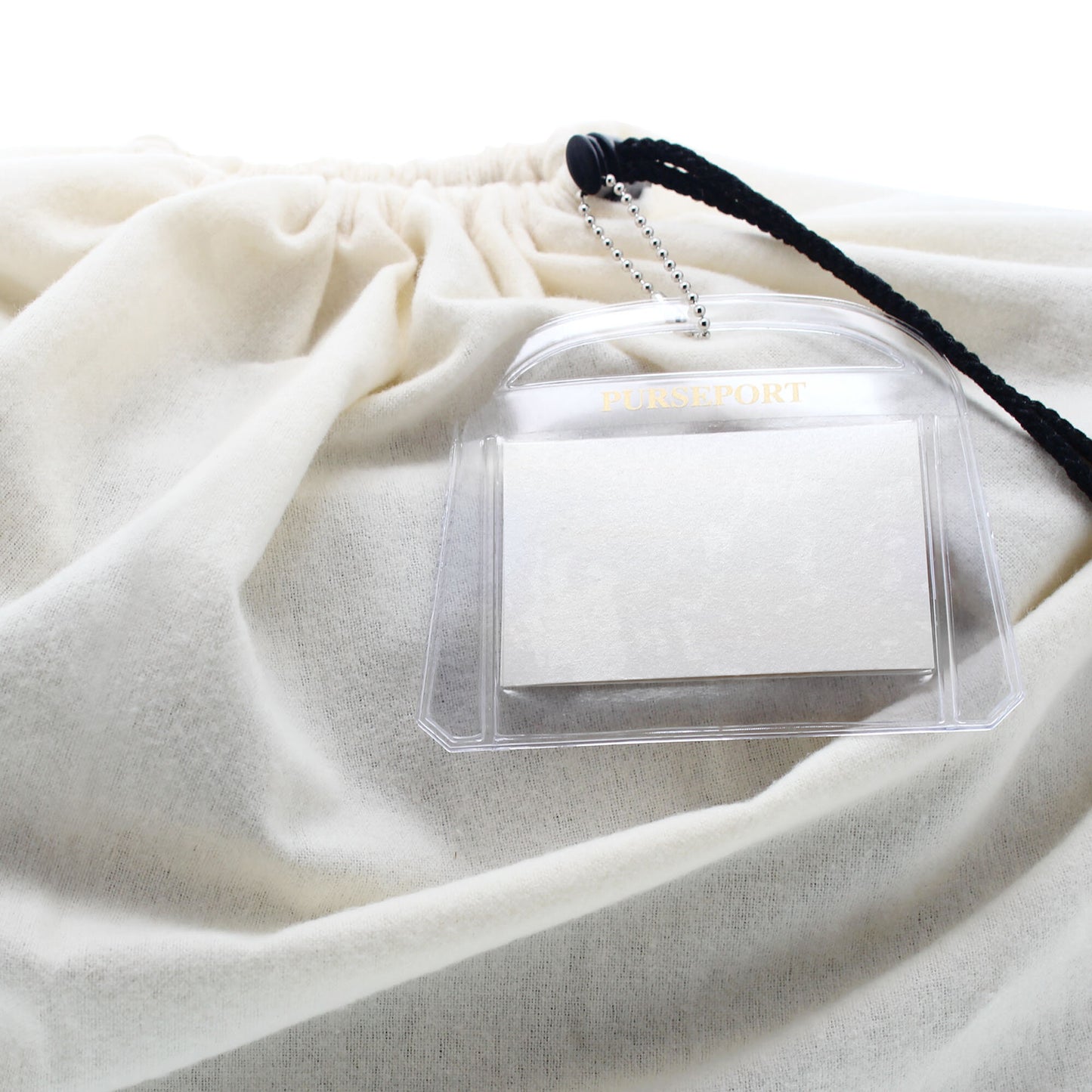 UNDERCOVERS™ DUST COVER WITH PURSEPORT™ ID TAG